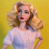 Photo of Gene Marshall doll wearing a Star Wardrobe Separates Creme Cardigan and Pants outfit