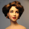 Franklin Mint Elizabeth Taylor vinyl doll wearing Classical Burgundy photo