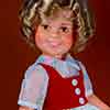 Shirley Temple Ideal vinyl 17 inch doll with velvet vest and flowered dress, 1972