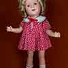 Shirley Temple 16 inch composition doll wearing Bright Eyes loop dress