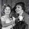 Shirley Temple and Claudette Colbert at the Oscars dinner in the Biltmore bowl, February 27, 1935