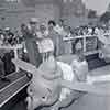 Pat Nixon, Tricia, Richard Nixon, and daughter Julie at Dumbo attraction, August 1955