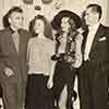 Director Charles Vidor, Shirley Temple, Rita Hayworth, and Glenn Ford on the set of Gilda, Fall 1945