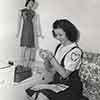 Shirley Temple sewing during the making of Kathleen, 1941