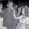 John Agar and Shirley Temple eating wedding cake, September 19, 1945